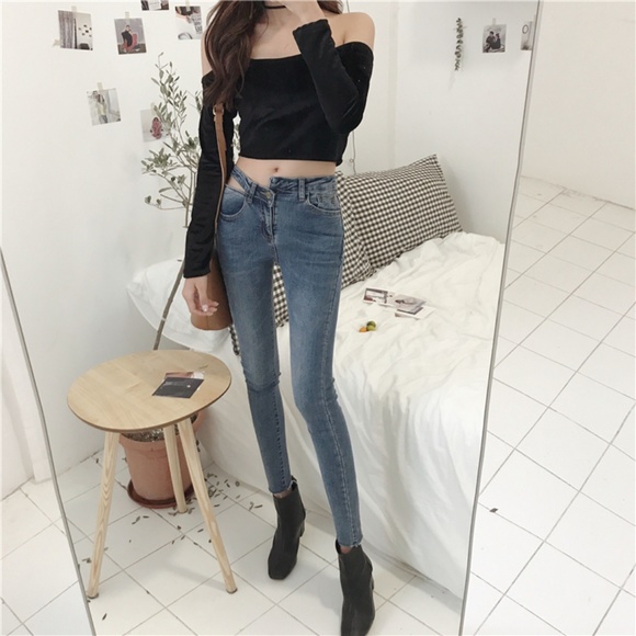 Denim - Asymmetrical cut out waist skinny jeans